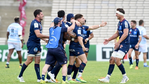Matthieu Jalibert of Bordeaux (c) takes the plaudits after his late heroics