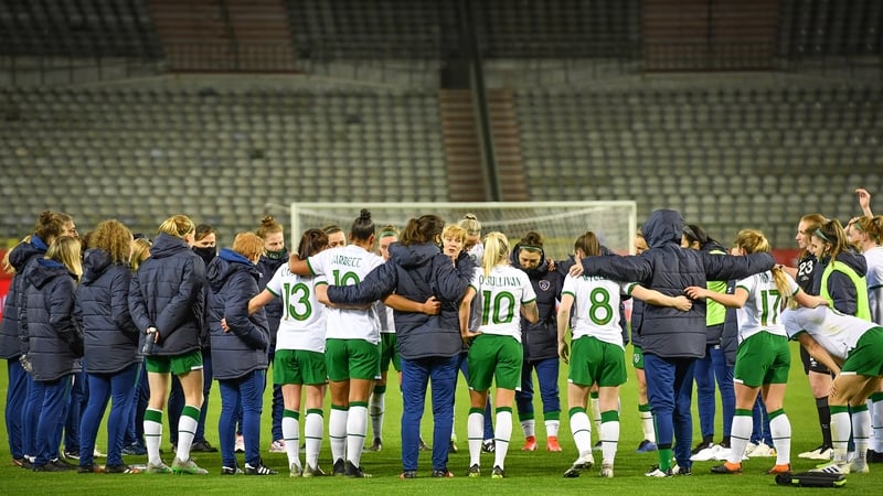 Irish players huddle together after the game in Brussels