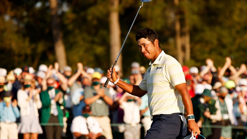 Hideki Matsuyama salutes the crowd