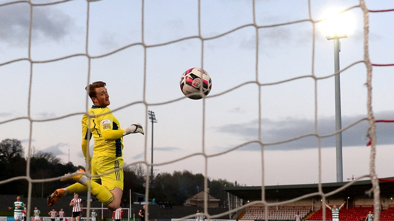 Derry City goalkeeper Nathan Gartside could do nothing to keep out Burke's effort from the halfway line