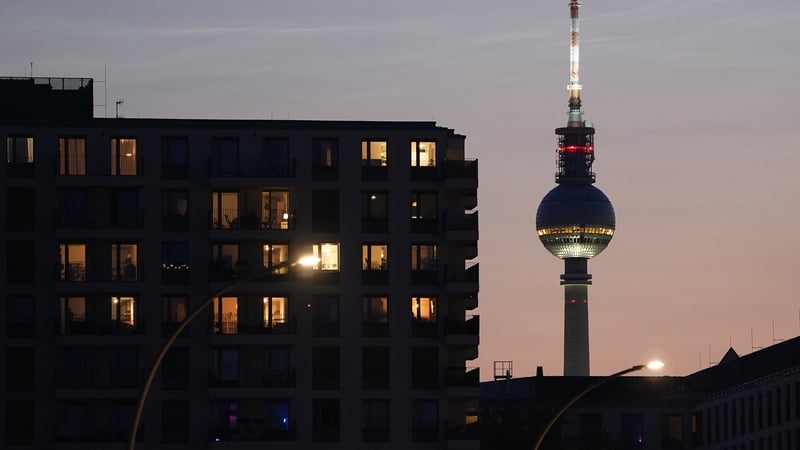 The broadcast tower at Alexanderplatz behind a new residential apartment building in Berlin