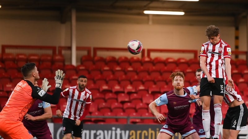 Ronan Boyce heading home Derry's equaliser