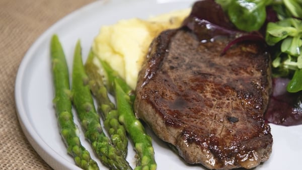Kevin Dundon's perfect beef striploin with confit garlic butter and asparagus.