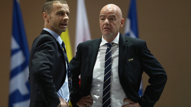 UEFA President Aleksander Ceferin (L) and FIFA President Gianni Infantino pictured in 2017