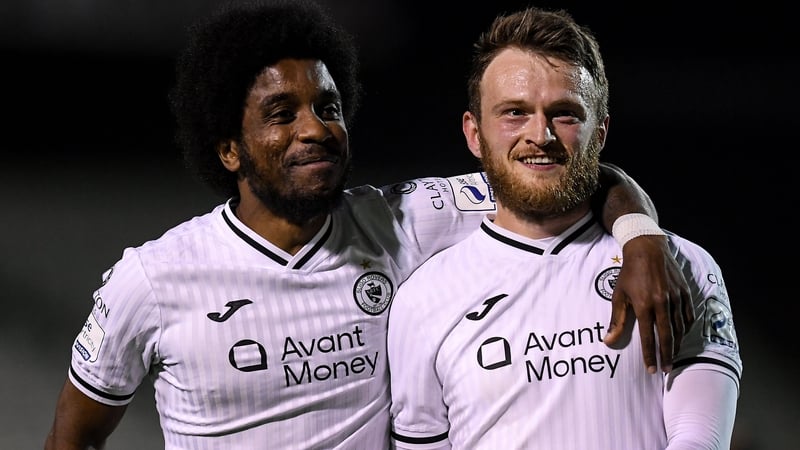 David Cawley who scored Sligo's third is congratulated by team-mate Walter Figueira
