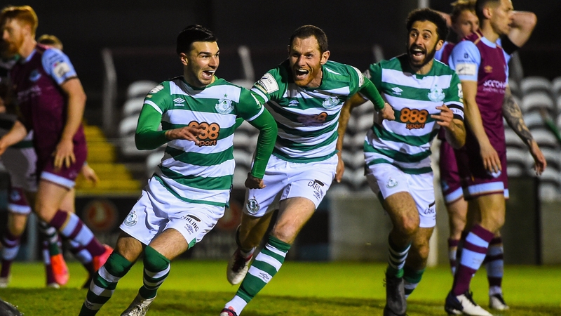 Danny Mandroiu celebrates his late, late winner for Rovers with Chris McCann and Roberto Lopes