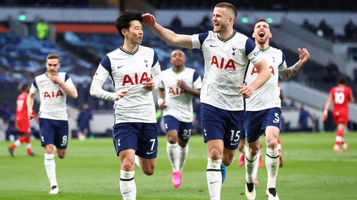 Son Heung-Min celebrates with Eric Dier after scoring the decisive spot-kick