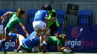 Dorothy Wall barges over for Ireland's opening try of the game