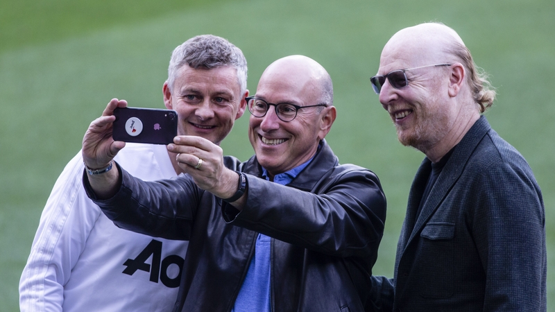 Ole Gunnar Solksjaer with a couple of the Glazer clan