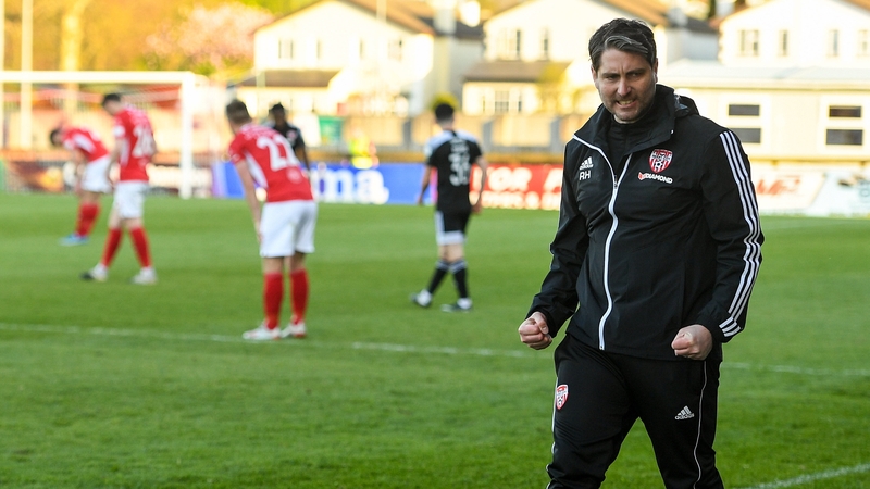 Ruaidhri Higgins celebrates at the final whistle