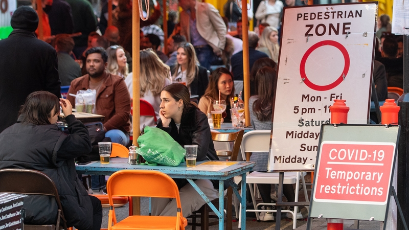 People eating and drinking outside today in London, England