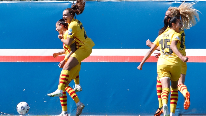 Jennifer Hermoso (L) celebrates with team-mates after scoring against PSG