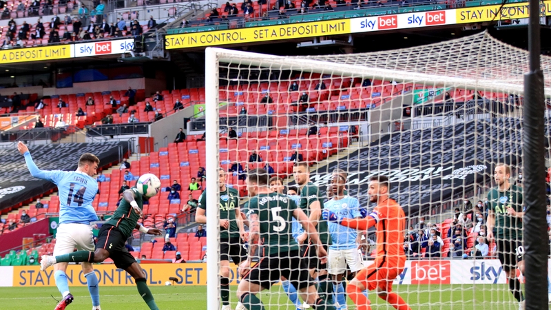 Manchester City's Aymeric Laporte (left) scores winner against Tottenham in Carabao Cup final