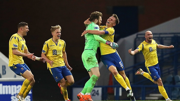 Zander Clark is congratulated after the levelling goal at Ibrox