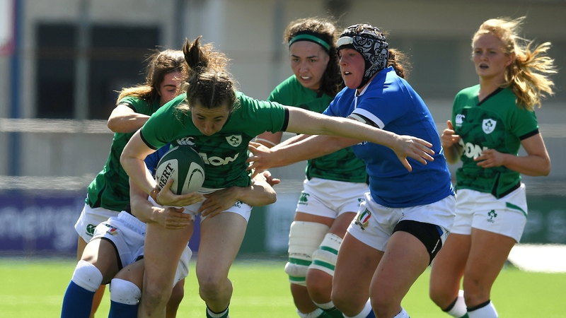 Eve Higgins is tackled by Veronica Madia and Erika Skofca