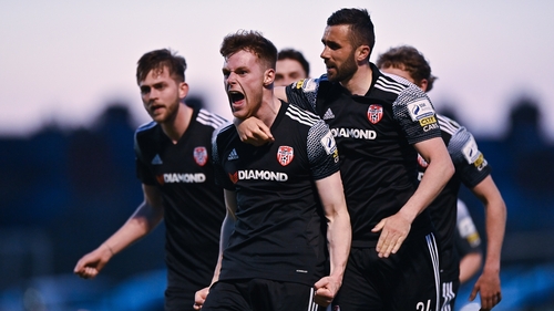 Cameron McJannet of Derry City, left, celebrates with team-mates