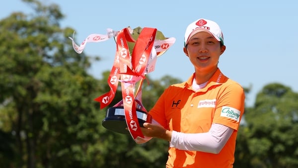 Kim with the winner's trophy