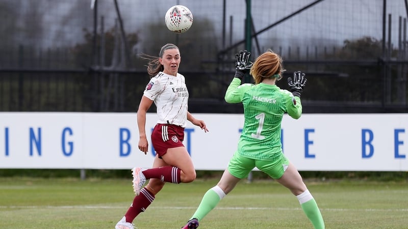 Irish international McCabe chips Everton goalkeeper Sandy MacIver