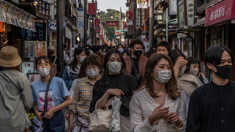 New figures show that Japan's consumer prices rose slightly in May for the first time in 14 months