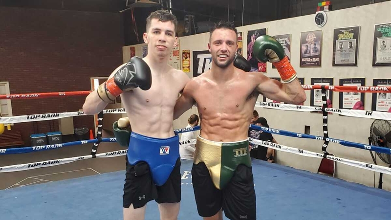 Stevie McKenna (left) with reigning world champion Josh Taylor