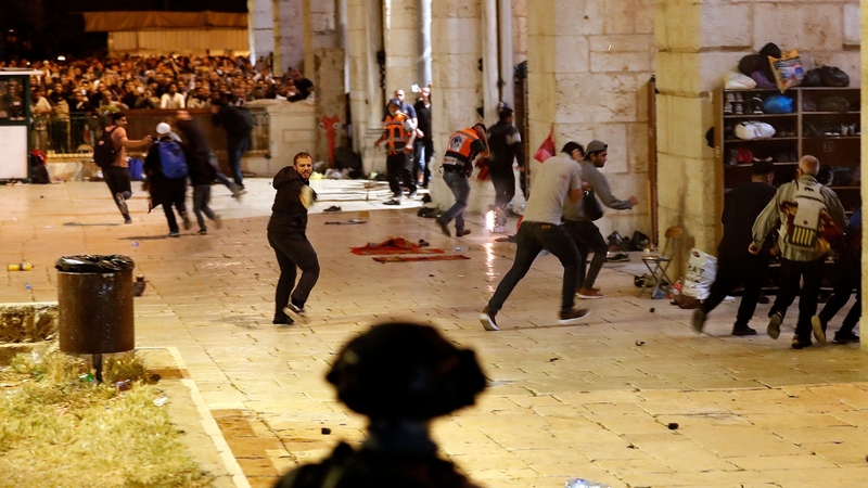 Israeli security forces clash with Palestinian protesters at the al-Aqsa mosque compound in Jerusalem