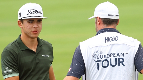 Garrick Higgo and his caddie on the 18th hole as he held a two-shot lead