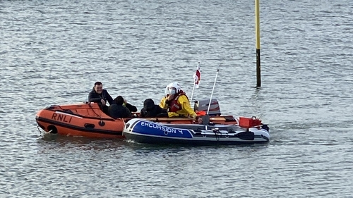 The scene in Howth harbour, Dublin today after the dinghy was towed ashore