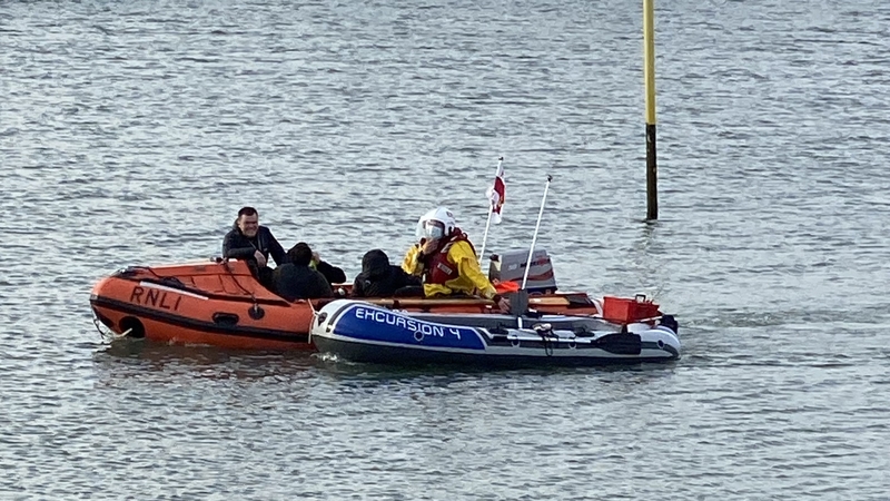 The scene in Howth harbour, Dublin today after the dinghy was towed ashore