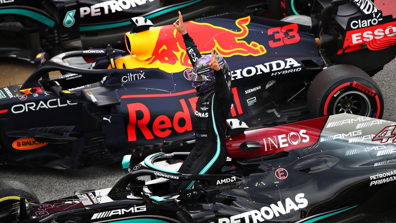 Lewis Hamilton celebrating victory in parc ferme