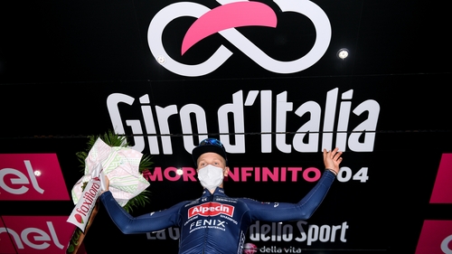 Tim Merlier of Team Alpecin-Fenix celebrates at podium
