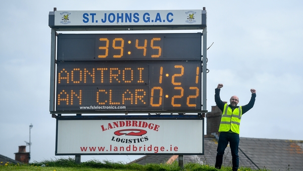 Corrigan Park steward Conor McCaffrey celebrates Antrim's win over Clare