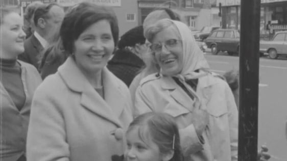 Two women waiting at a bus stop, Camden Street (1971)