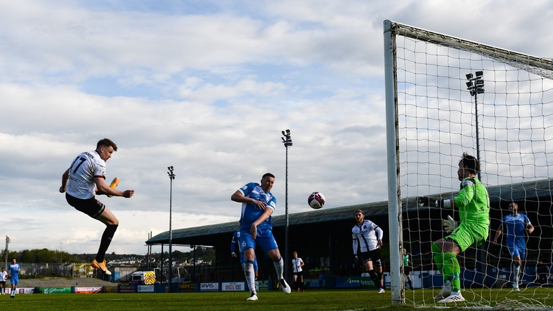 Ole Erik Midtskogen of Dundalk heads home