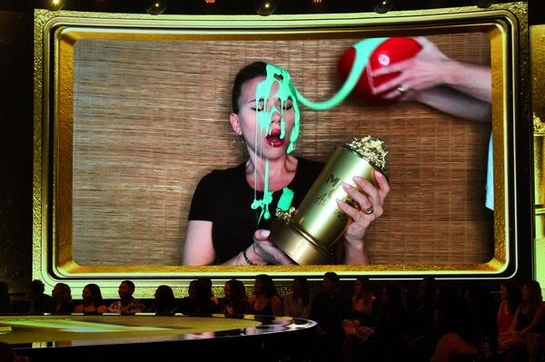 Scarlett Johansson was covered in slime by husband Colin Jost while accepting an honour during the MTV Movie & TV Awards (Picture: Getty)