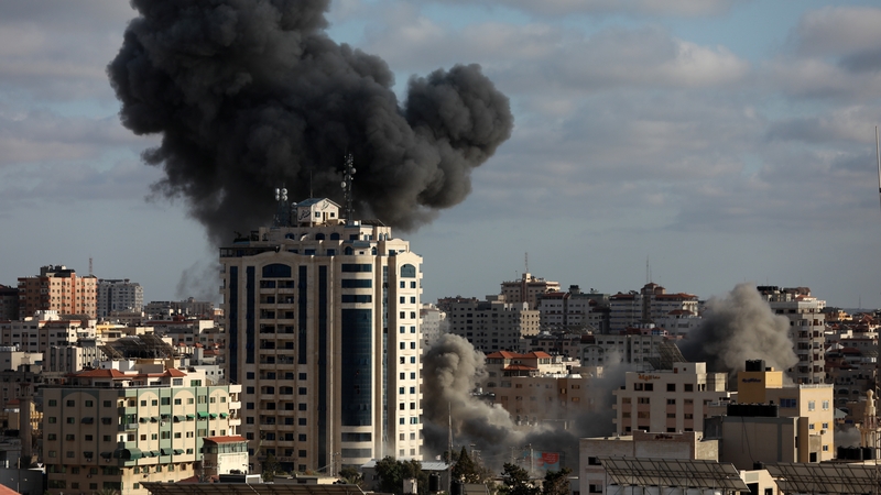 Smoke rises following an Israeli air strike on Gaza City today