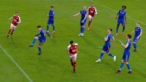 Robbie Benson celebrates after scoring the late, late winner from the spot