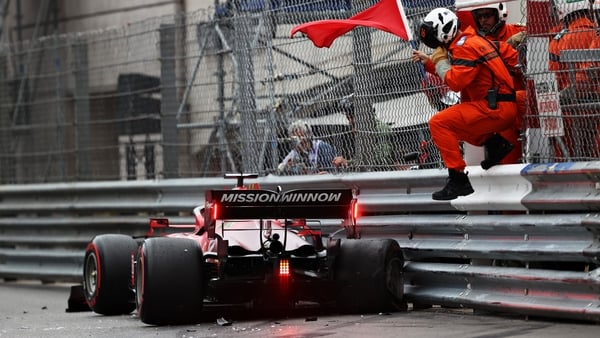 Leclerc's Ferrari in the barrier after his crash