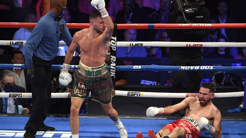 Josh Taylor reacts after knocking down Jose Ramirez