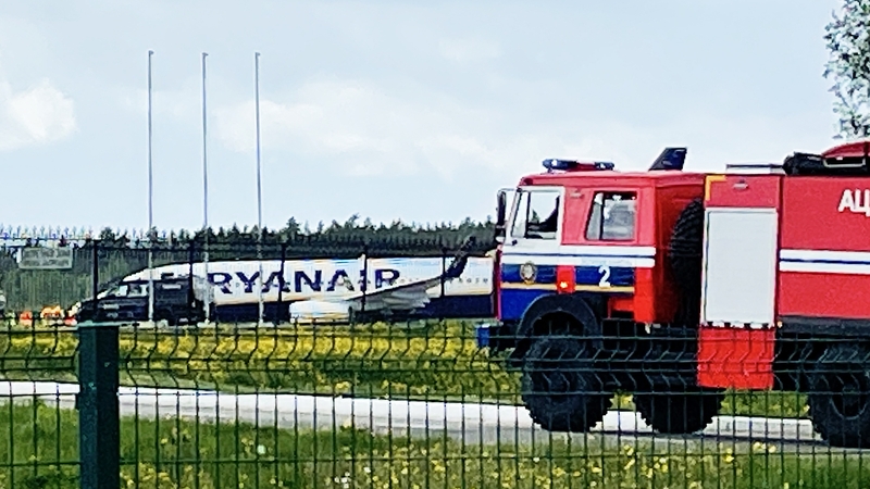 The Athens-to-Vilnius flight carrying a wanted opposition activist was forced to land in Minsk on Sunday over a supposed bomb scare