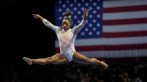 The gymnast appeared to be sending a message through the medium of diamante.
