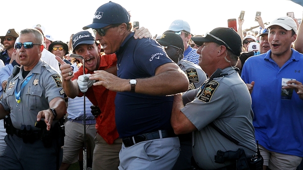 Phil Mickelson at the 18th fairway after playing an approach shot