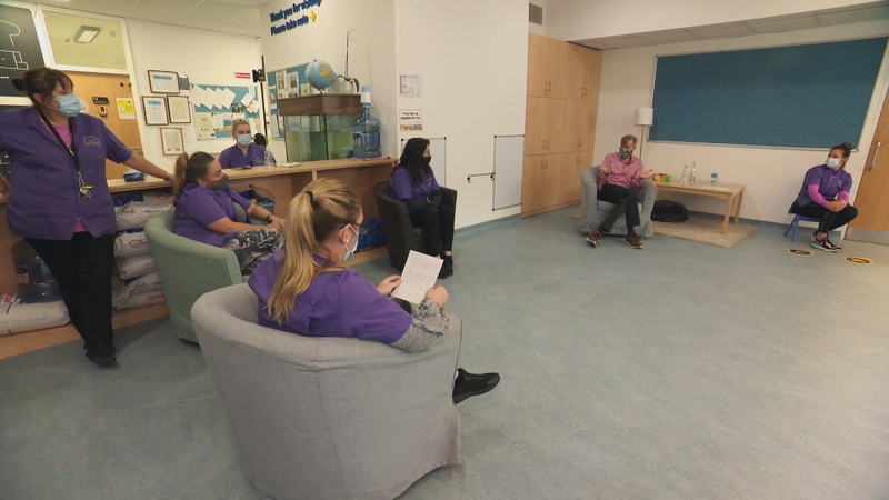 Dr Iain Morrison takes questions from childcare workers at Our Lady's Nursery in Ballymun
