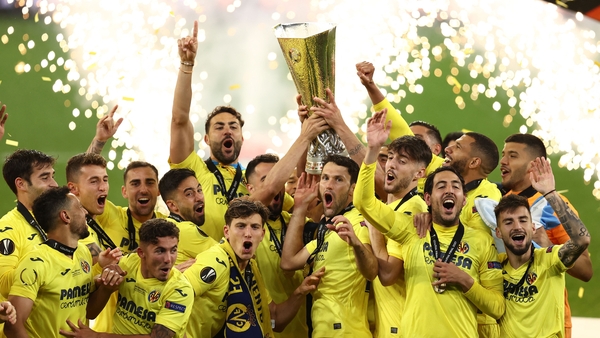 Villarreal players celebrate with the Europa League trophy