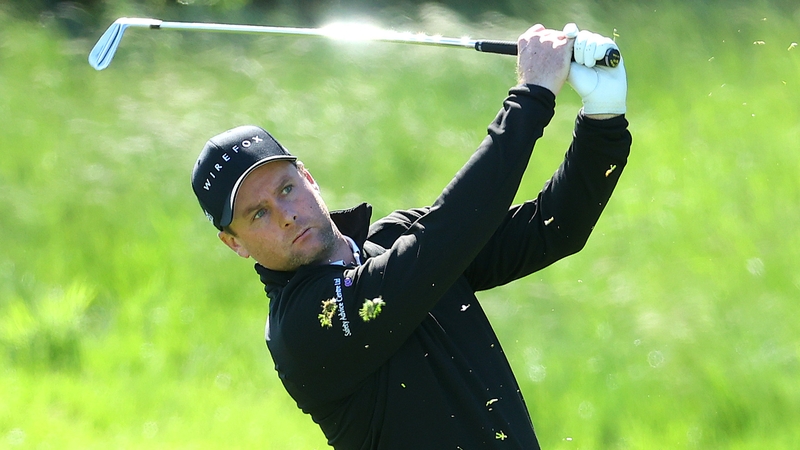 Jonathan Caldwell plays his second shot on the 18th hole