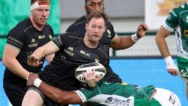 Connacht scrum-half Kieran Marmion is tackled by Toa Halafihi