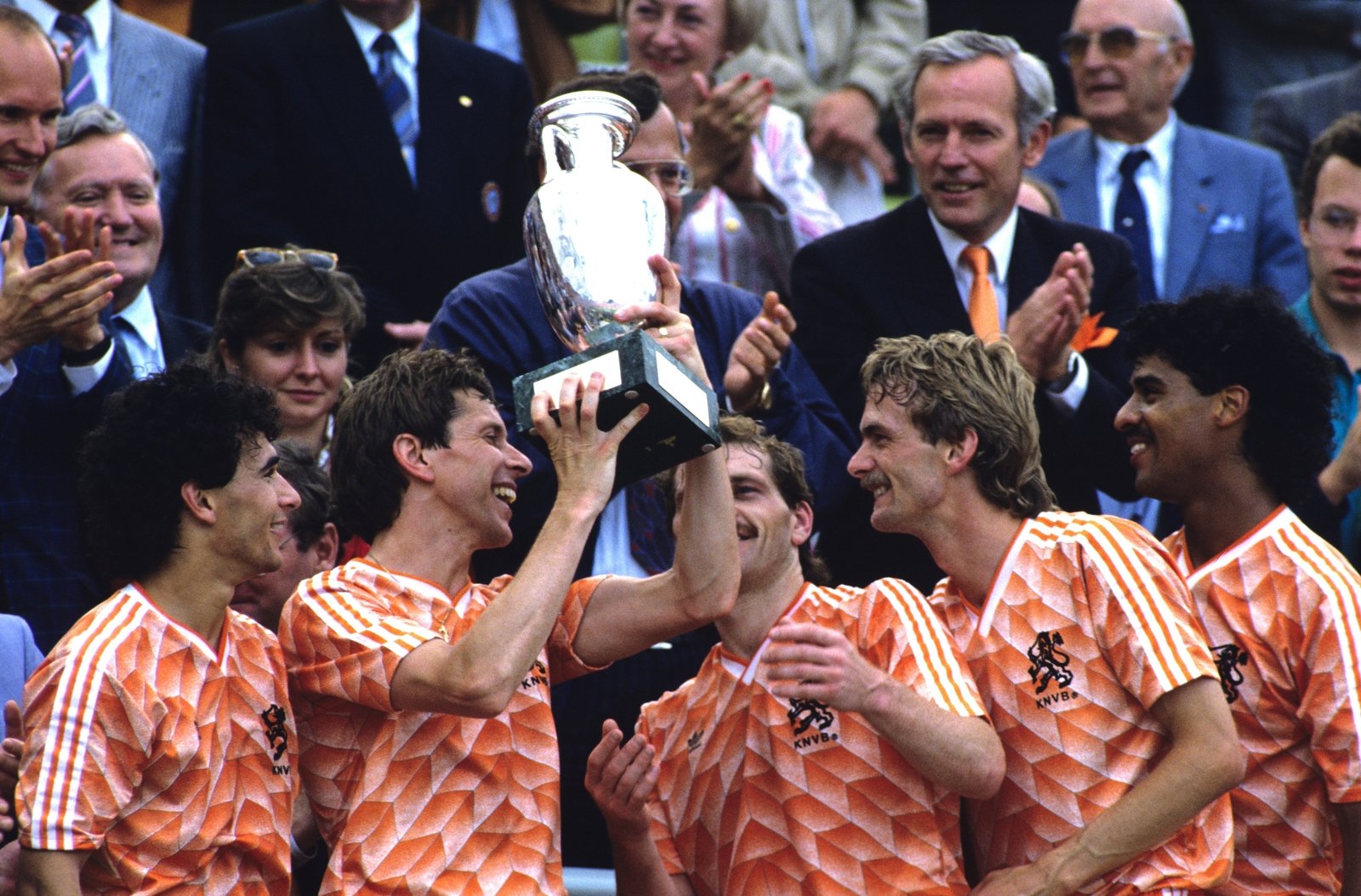 Arnold Muhren holding the trophy aloft as team-mates look on