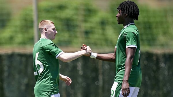 Ross Tierney, left, celebrates his goal with team-mate Joshua Kayode
