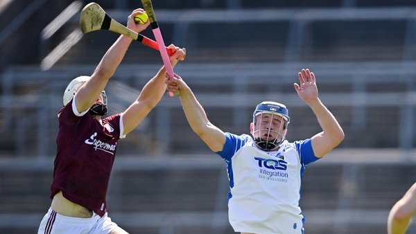 Daithi Burke of Galway in action against Stephen Bennett of Waterford