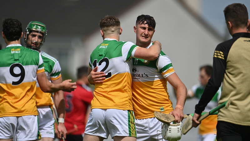 Offaly players Oisín Kelly, centre right, celebrates with team-mate Brian Duignan in Tullamore