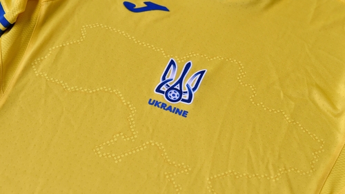 The uniforms feature the silhouette of Ukraine that includes Russia-annexed Crimea and the separatist-controlled regions of Donetsk and Lugansk as well as slogans